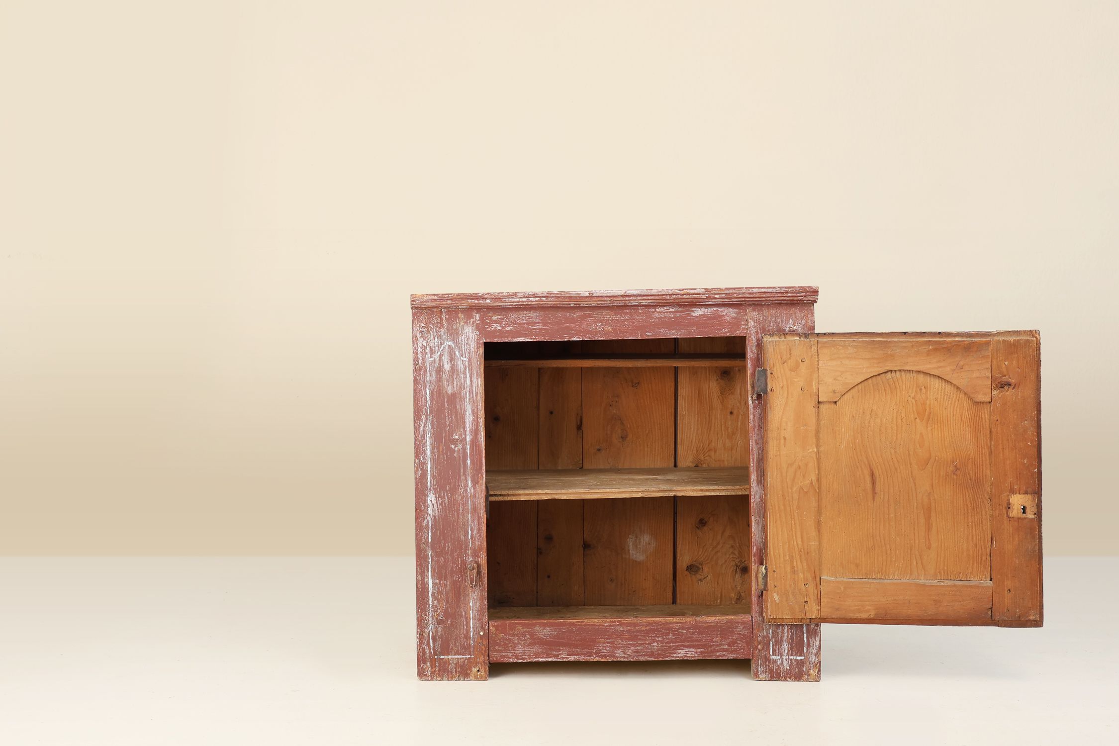 Rustic Parisian cabinet in pine wood with old burgundy paint layers, ca. 1820thumbnail